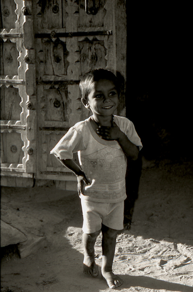 India-Rajasthan-bare-footed-young-boy